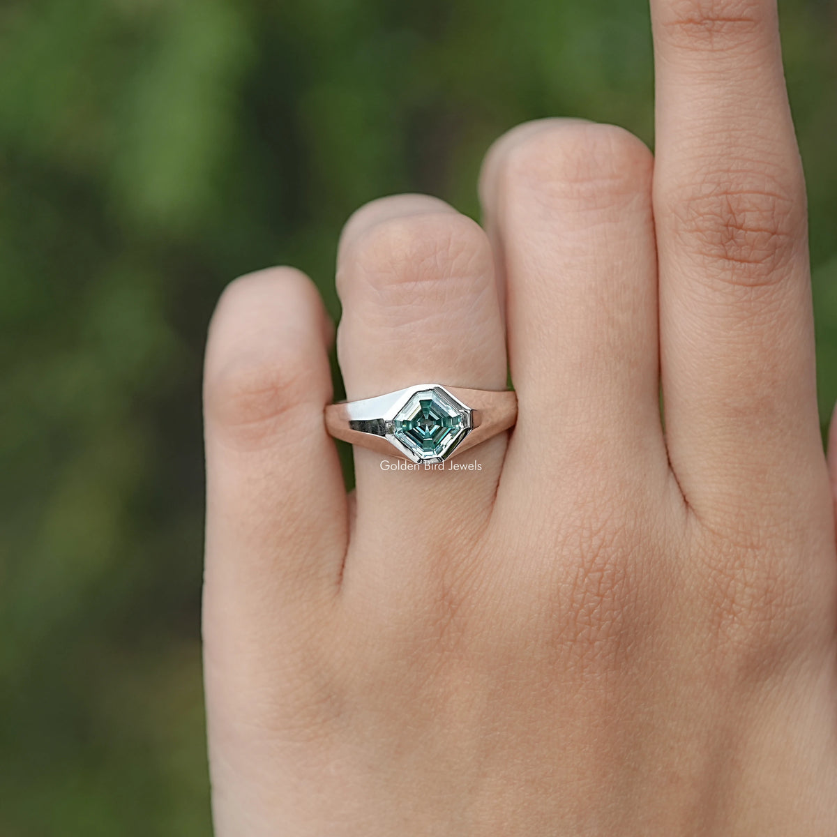 In finger front view of Moissanite Engagement Ring in Asscher Cut Stone