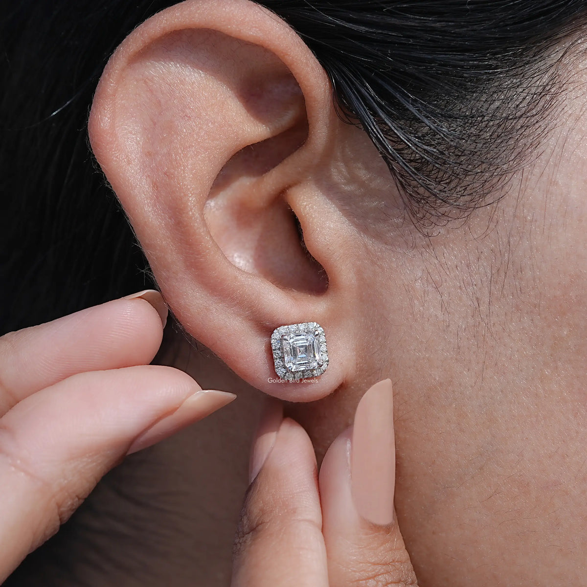 Front view of asscher shaped screw black diamond stud earrings