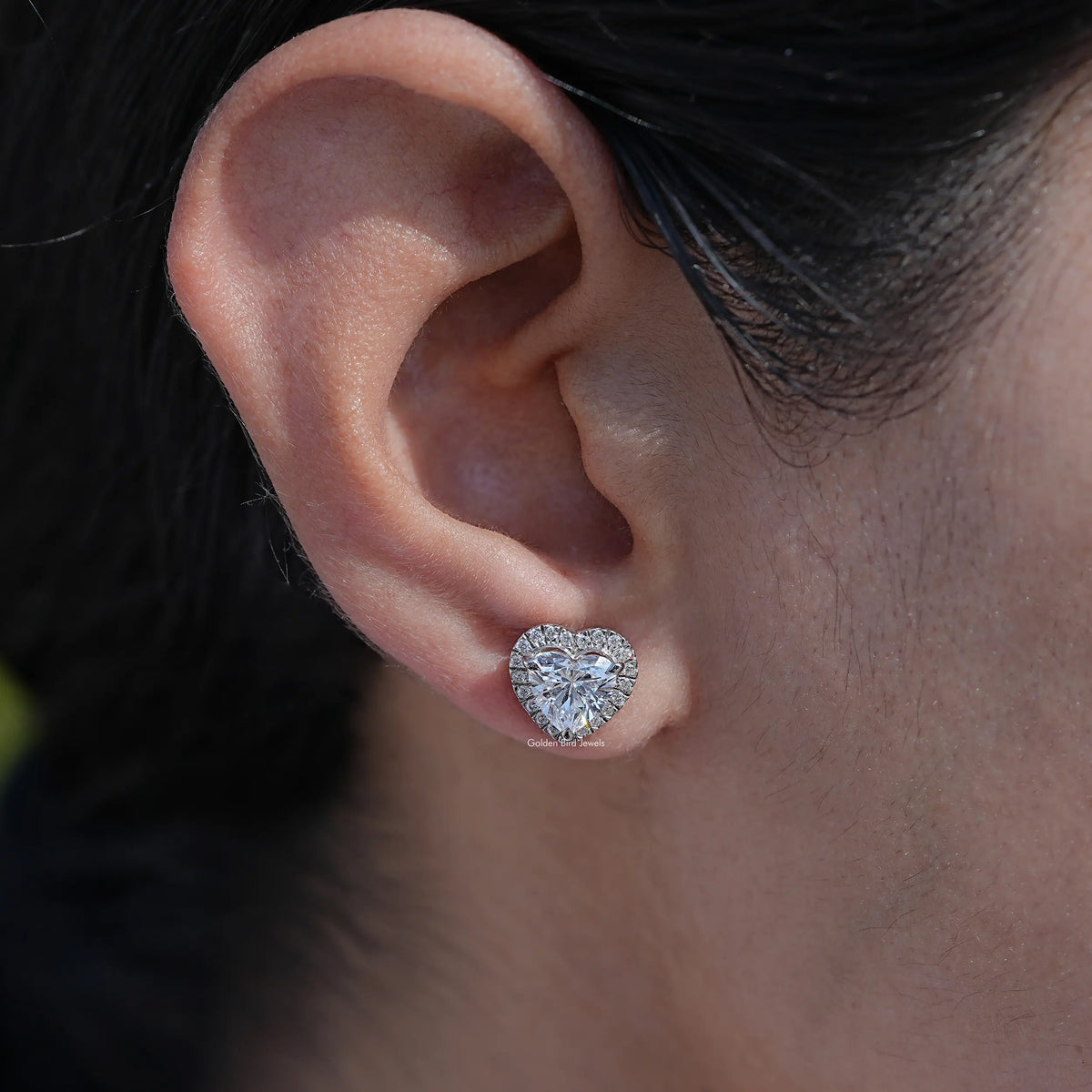 In ear view of heart cut cluster diamond earrings