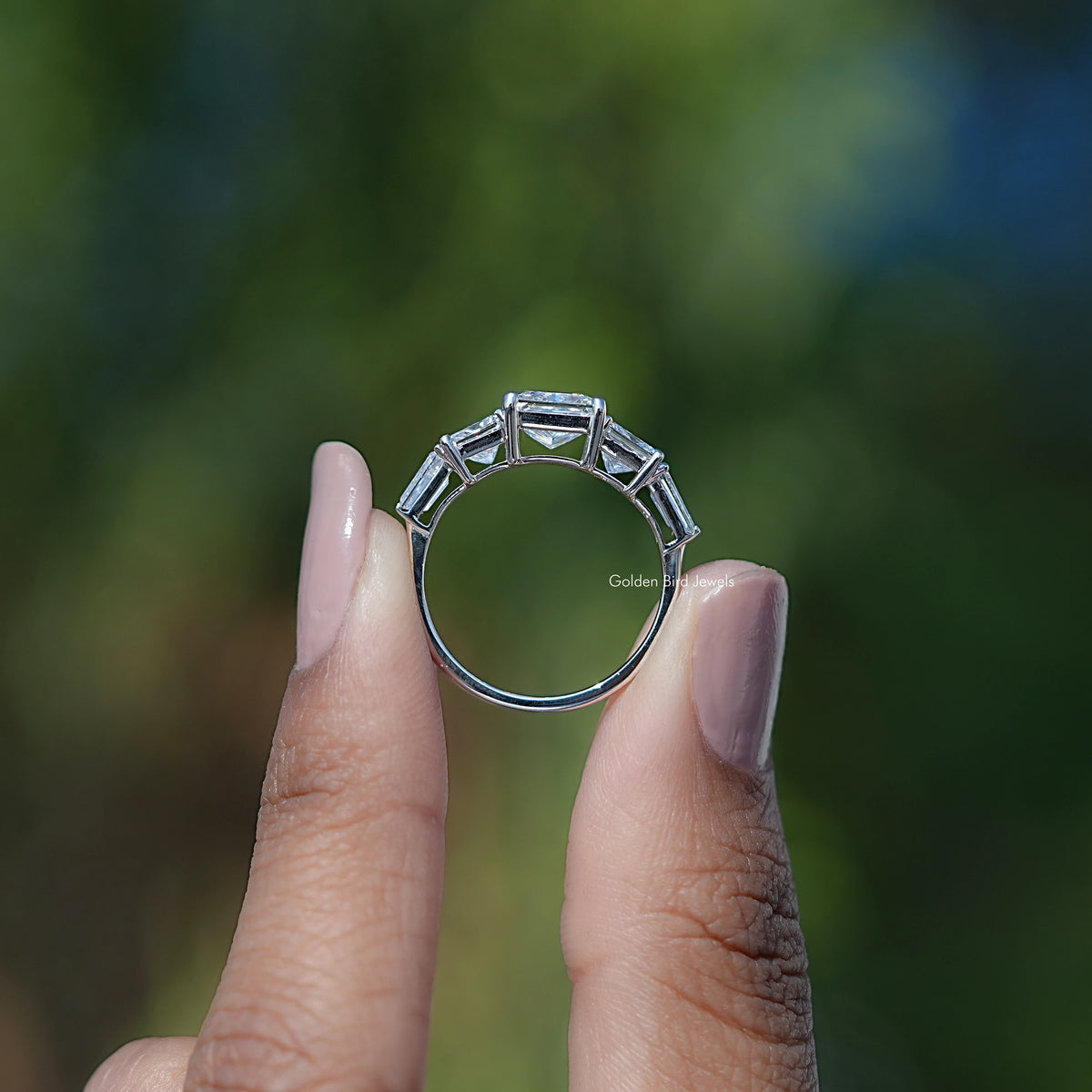 Back View of Princess Cut Diamond Five Stone Ring In two fingers