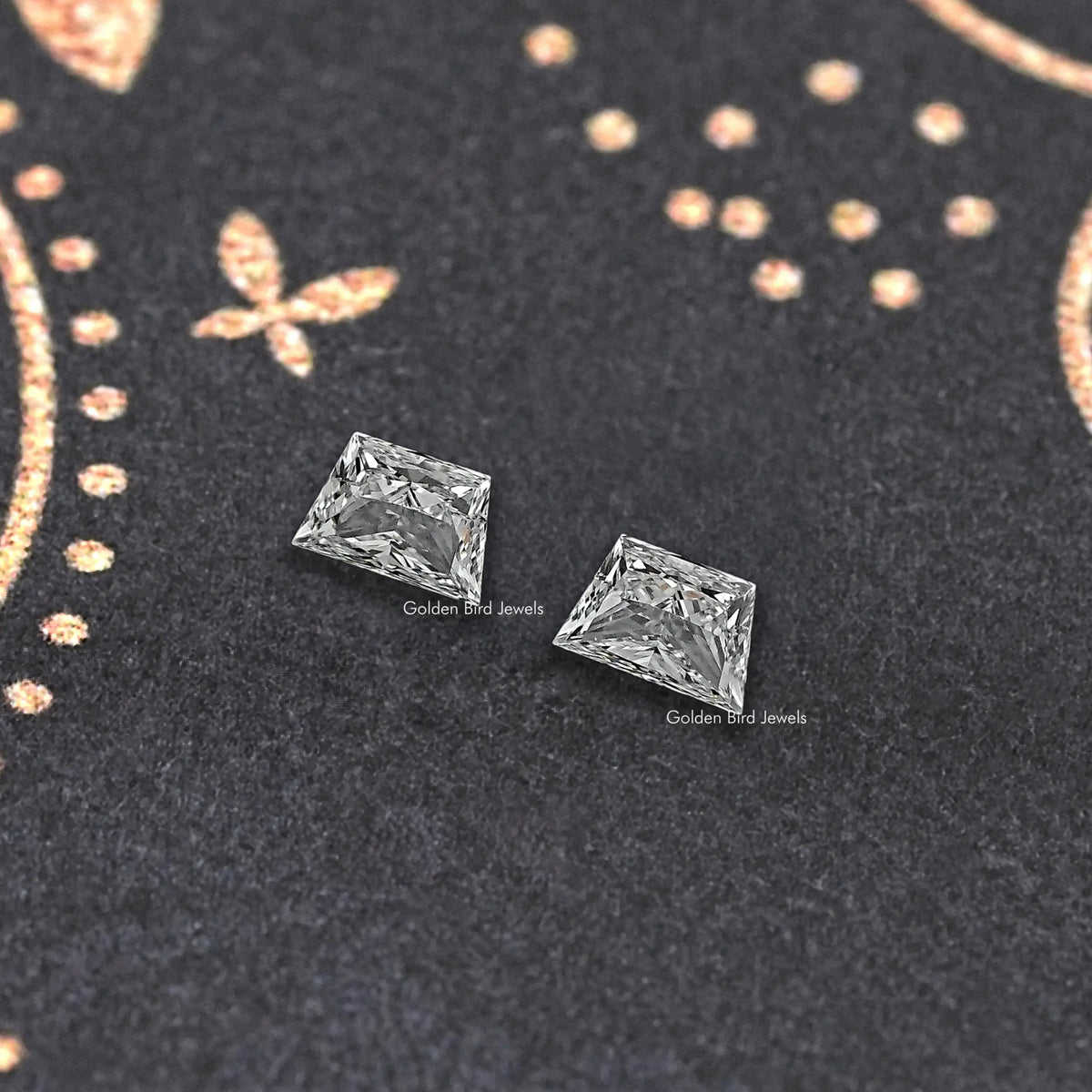 Trapezoid-cut lab diamond stud pair, angled close-up