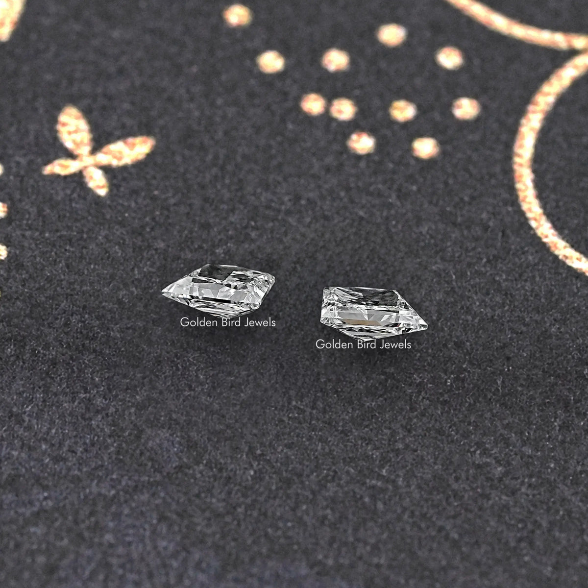 Trapezoid-cut lab diamond stud pair with clear, faceted brilliance