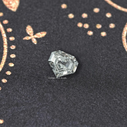 Single faceted step-cut lab-grown diamond with angled sparkle from the table