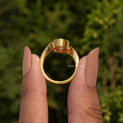 Gold-tone ring band interior view, round profile of bypass solitaire setting