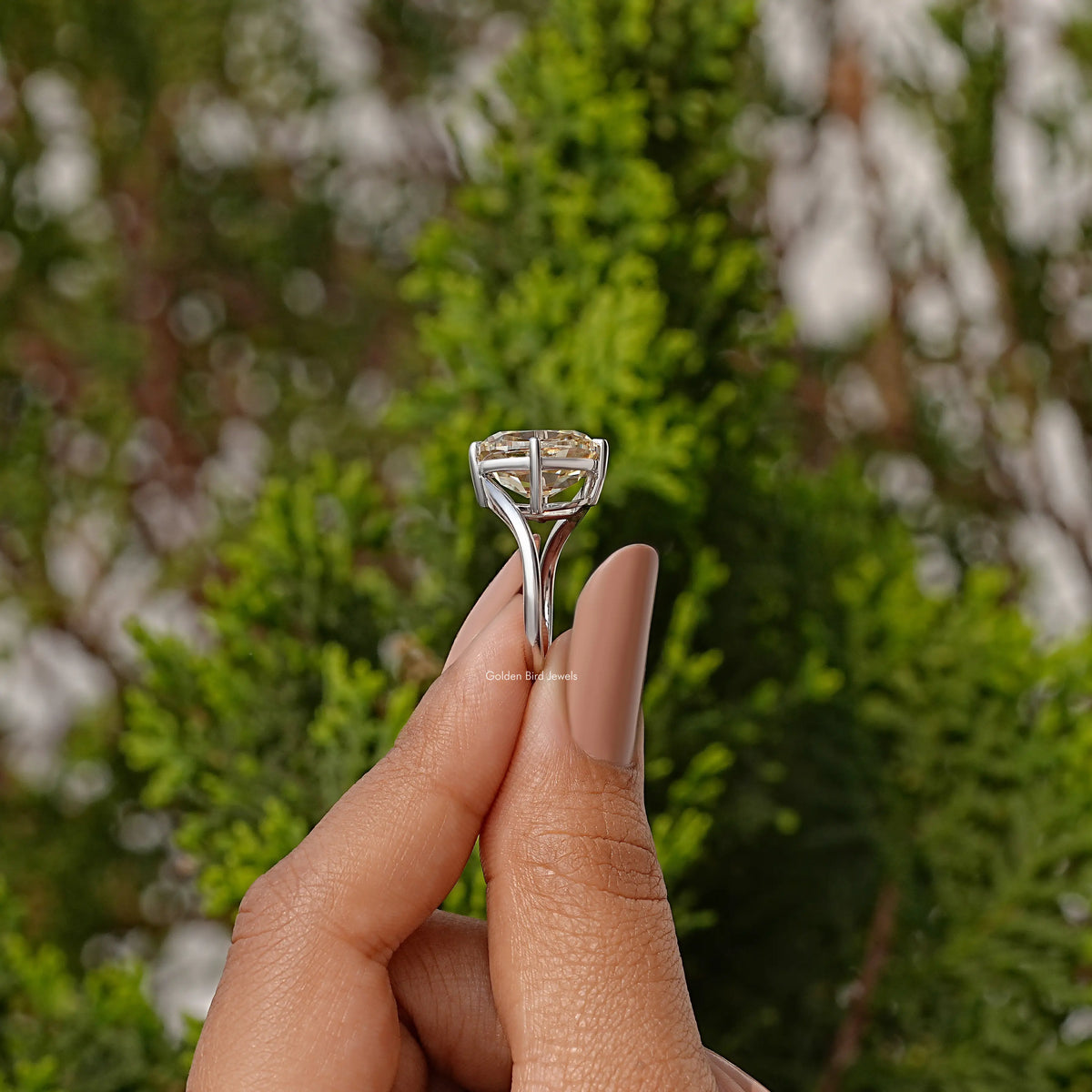 Sterling silver bypass shank solitaire ring with cushion-cut clear moissanite center