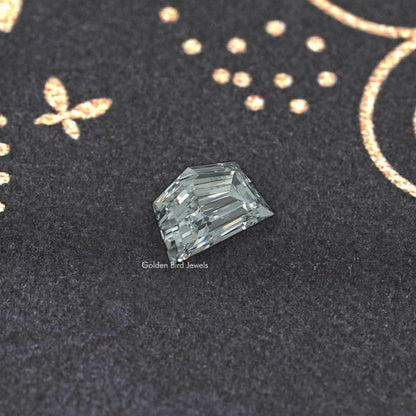 Rectangular emerald-cut lab-grown diamond with step facets, clear