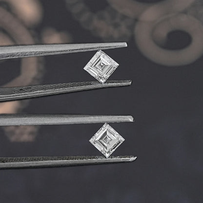 Carre-cut lab diamond studs in prong settings, side view