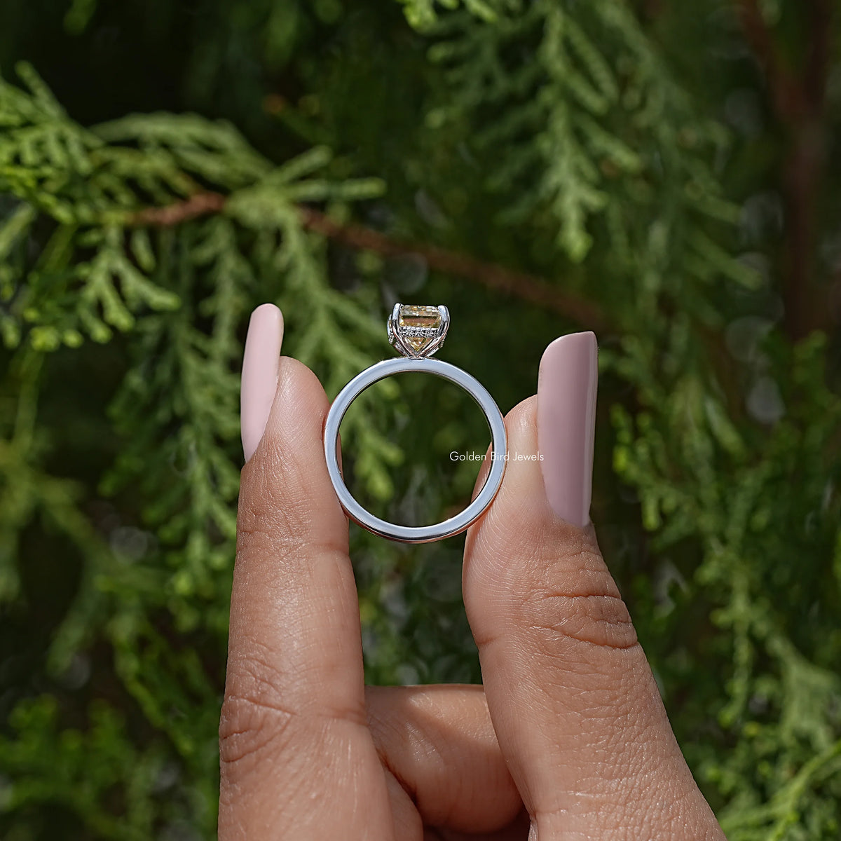 Sterling silver solitaire ring with yellow emerald-cut stone, top view