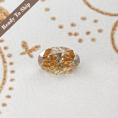 Oval loose moissanite gemstone, golden-brown with bright star-like facets