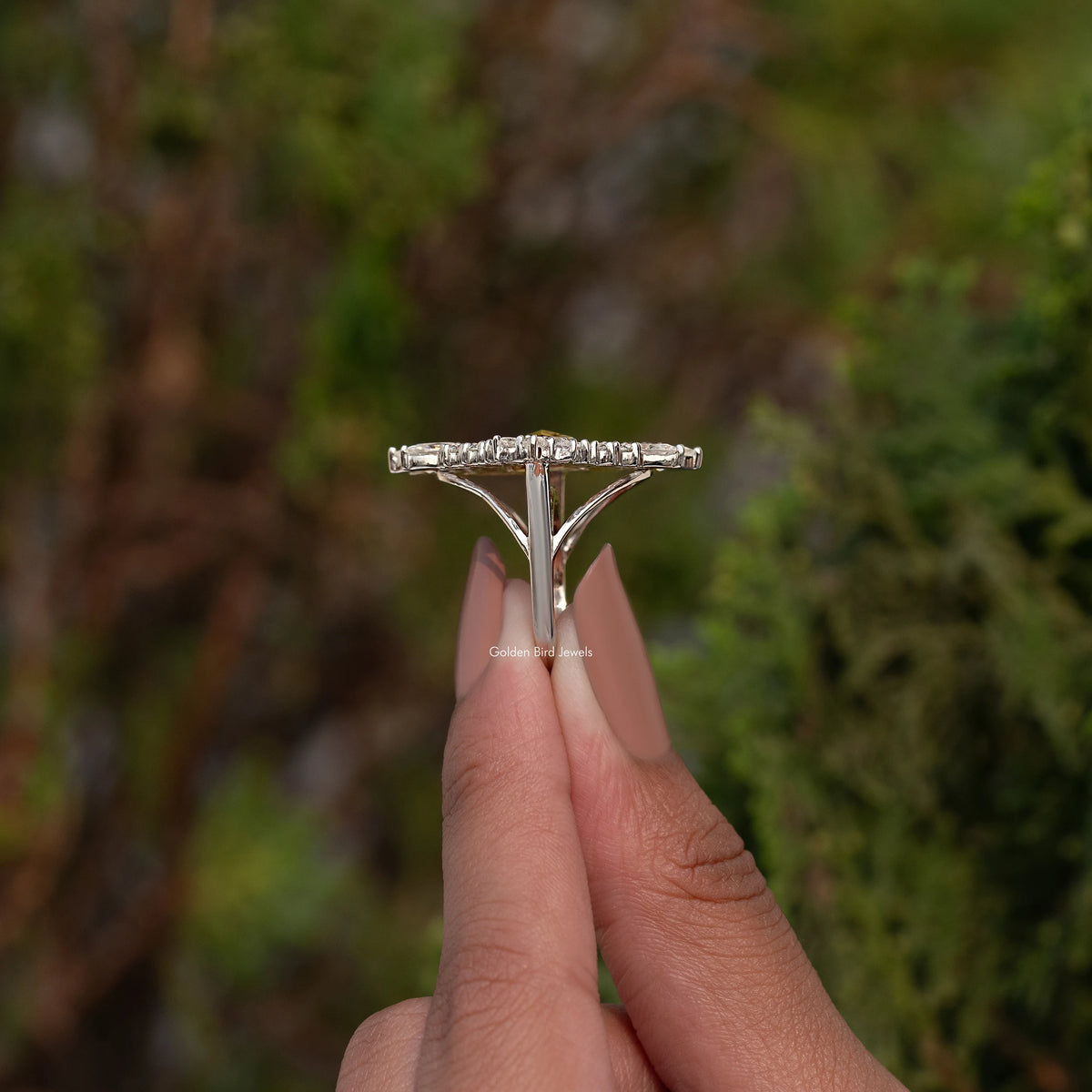 Vintage moissanite ring with marquise center stone and open gallery setting