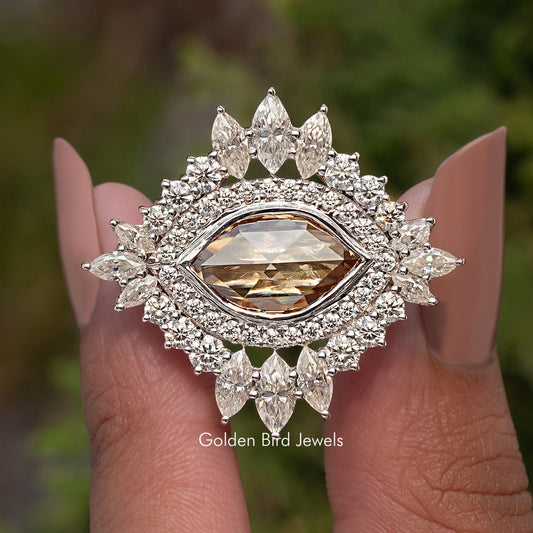 Vintage halo moissanite ring with marquise champagne center stone and multi-prong crown