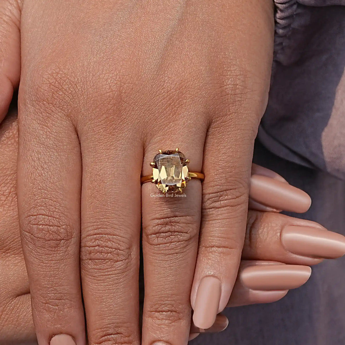 Champagne cushion-cut moissanite ring with gold prong setting, simple band