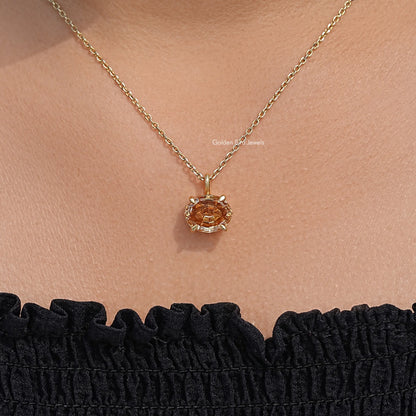 Champagne oval moissanite pendant on gold chain, close-up view