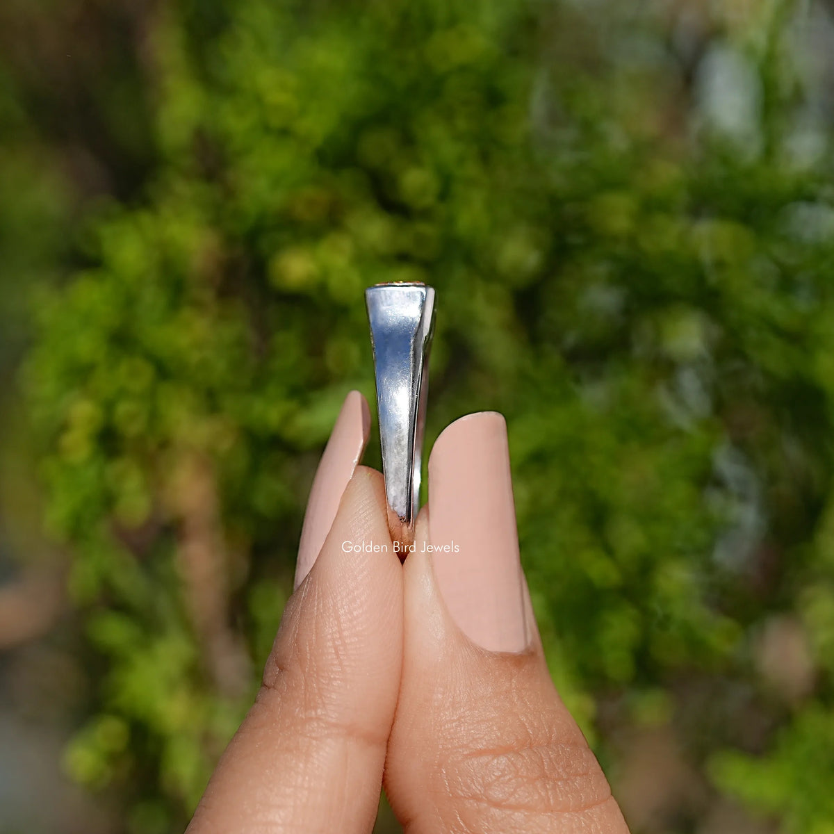 Sterling silver criss-cut moissanite solitaire ring, side view, square champagne stone