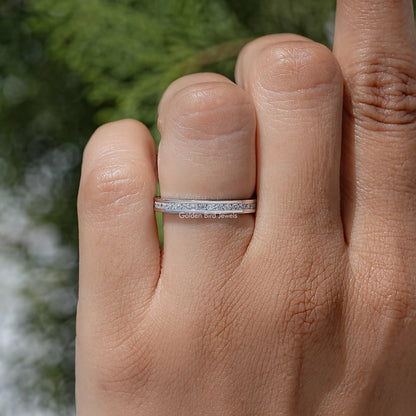 Silver-tone moissanite eternity band with round stones channel-set across the top