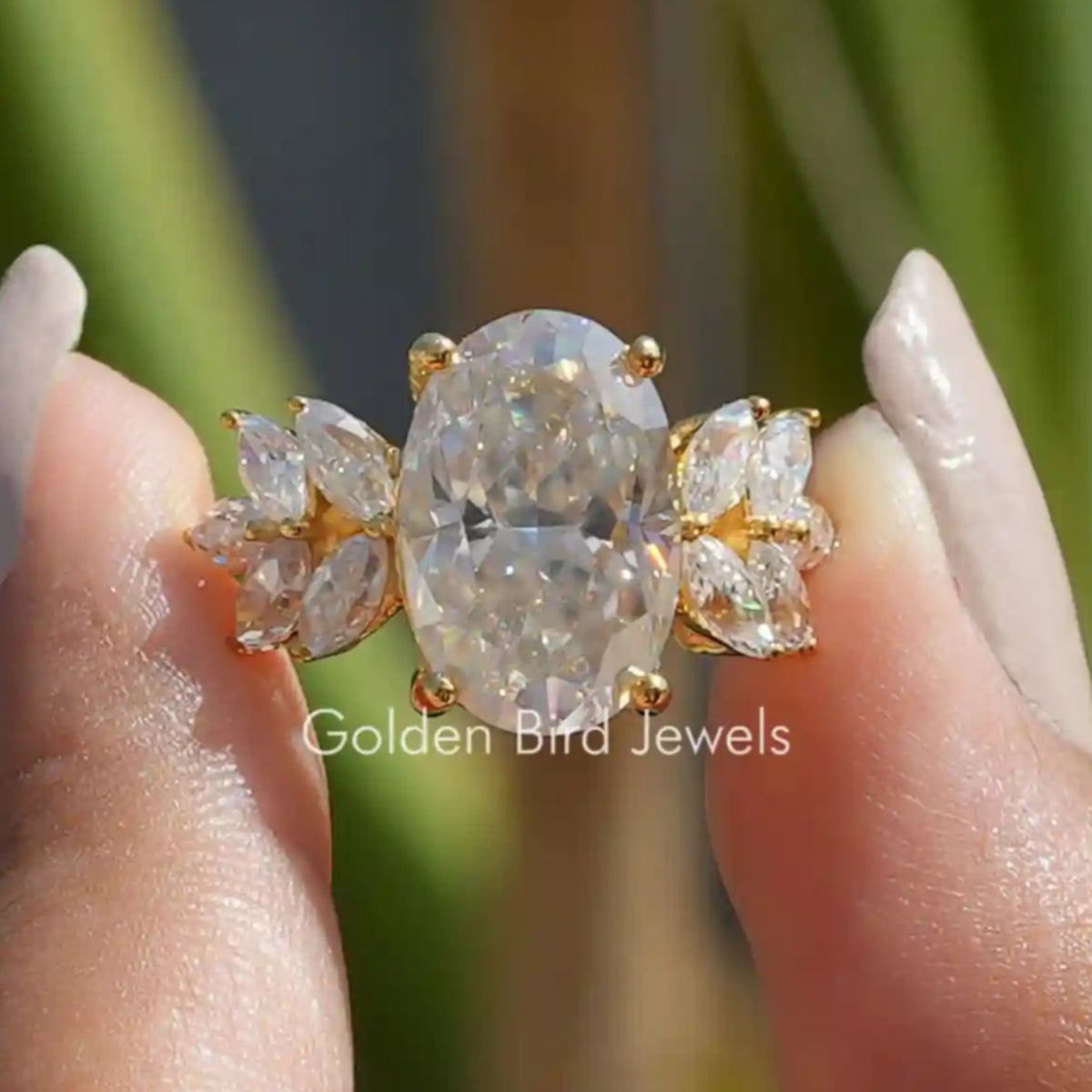 Front View of Oval Cut Moissanite Engagement Ring In two Fingers