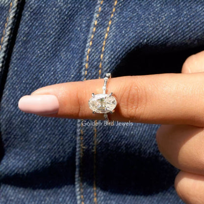 In finger front View of Crushed Ice Oval Cut Moissanite Ring