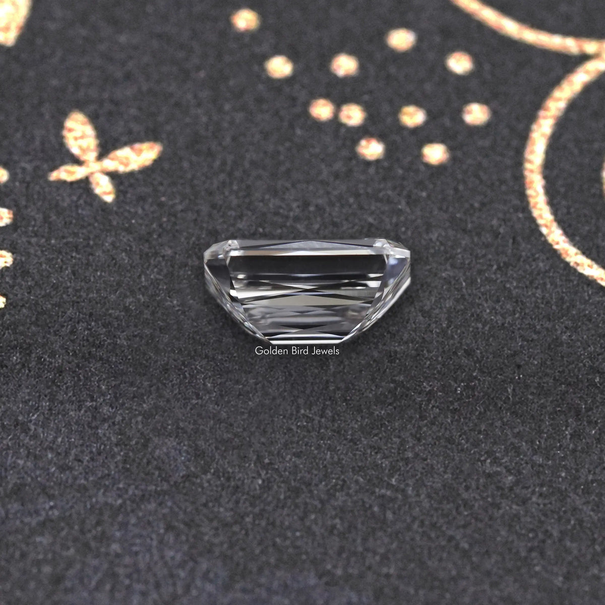 Square emerald-cut lab-grown diamond with centered table facet, neutral sparkle