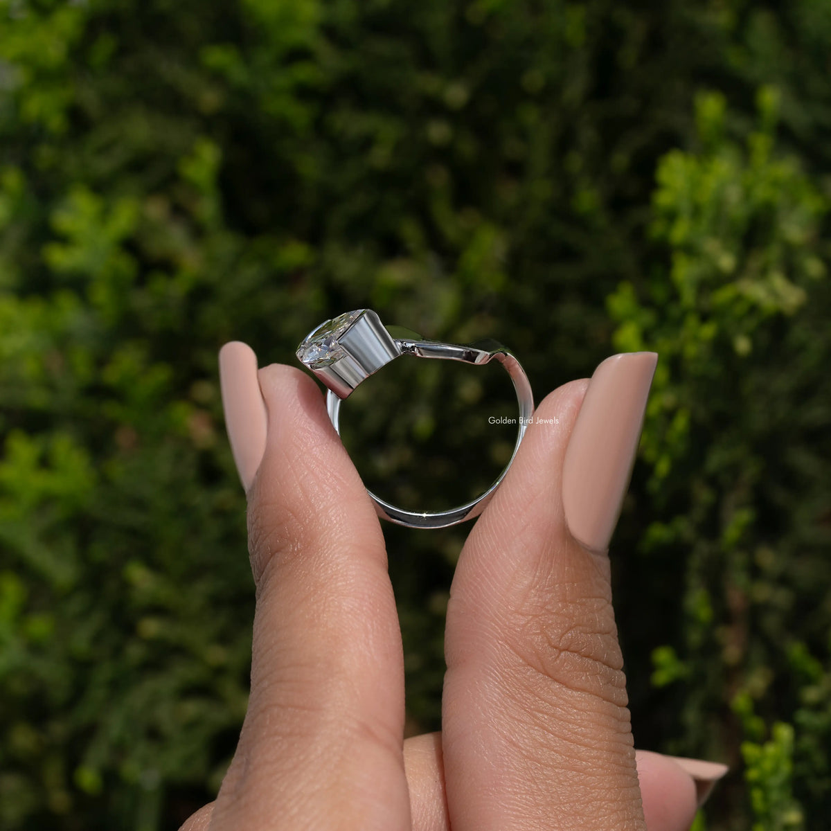 Oval moissanite solitaire ring, sculpted curved 925 silver band on fingers
