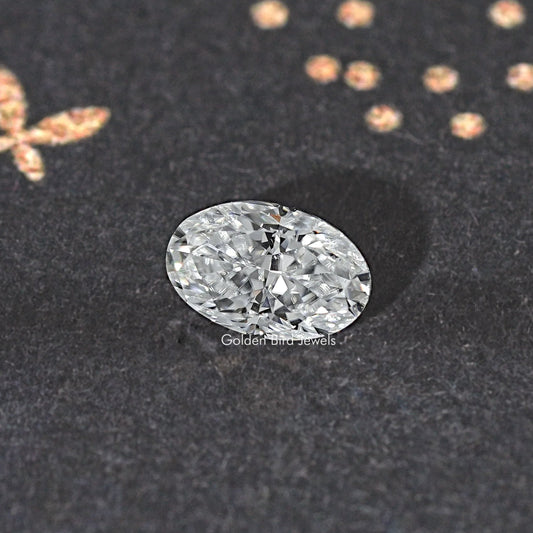 Oval crushed ice moissanite gemstone, wide close-up of sparkling faceted table