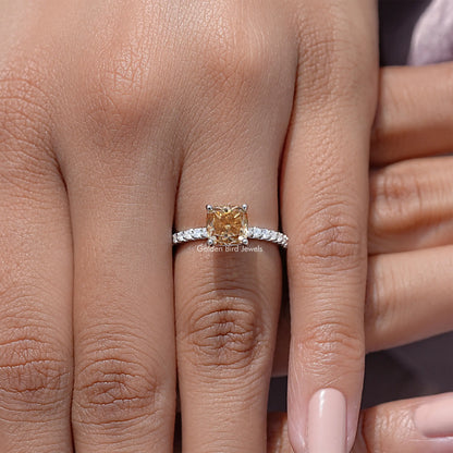 Cushion-cut moissanite engagement ring with pavé sterling silver band