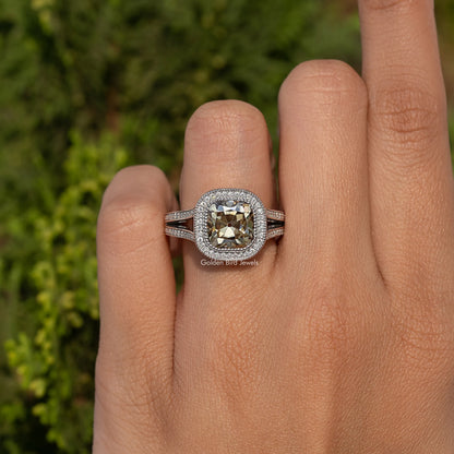 Old Mine cushion-cut moissanite halo ring in sterling silver on a hand