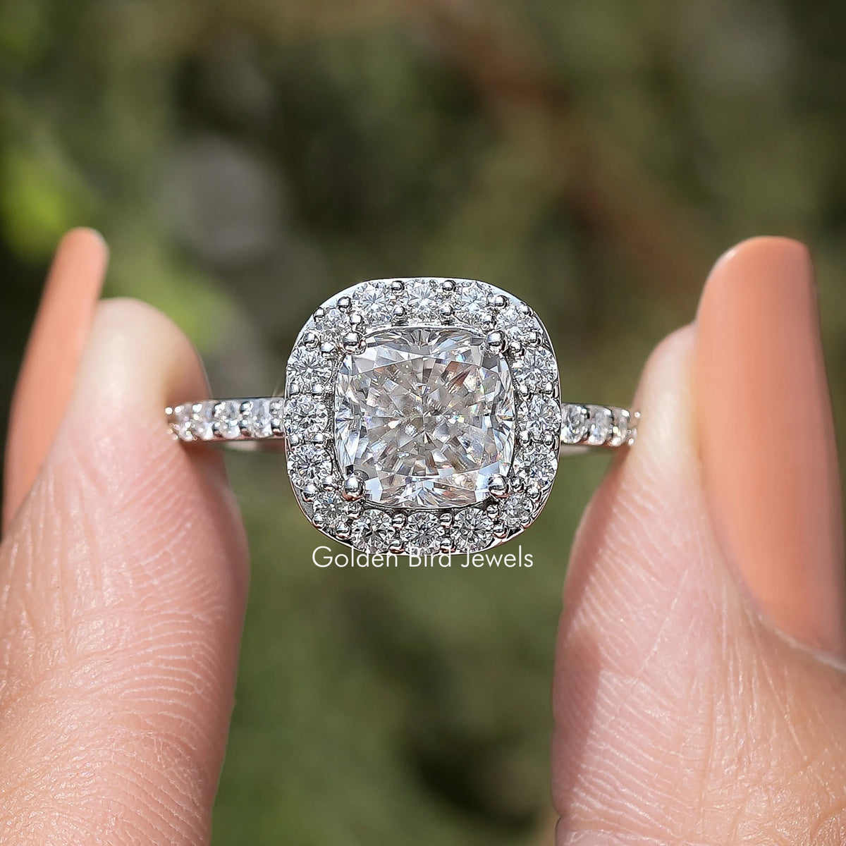 Cushion cut moissanite halo ring with pavé band