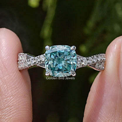 Cushion moissanite engagement ring with twisted silver band