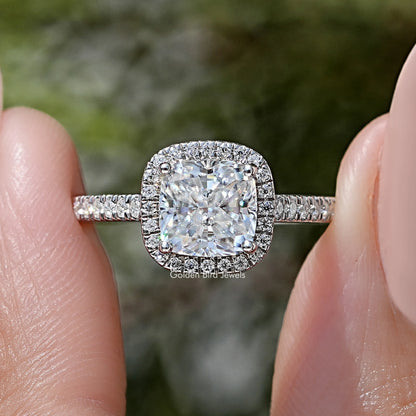 925 sterling silver ring with cushion-cut moissanite center and halo accents