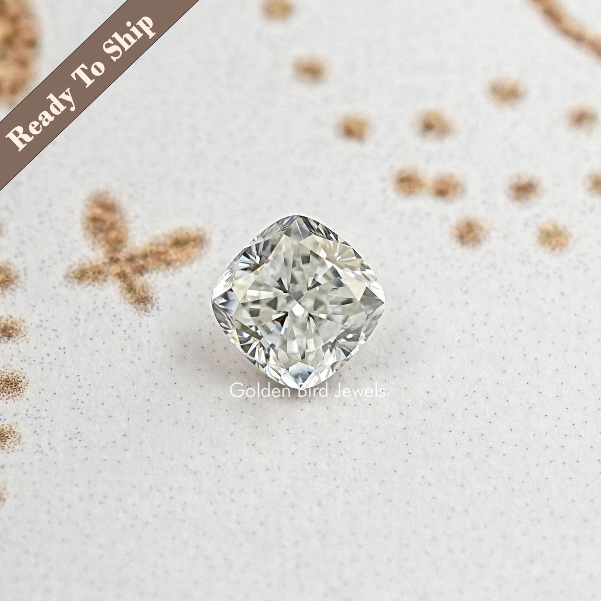 Cushion-cut moissanite loose stone with rounded corners and crisp facets