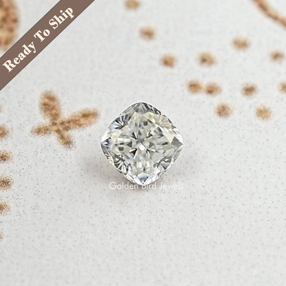 Cushion-cut moissanite loose stone with rounded corners and crisp facets