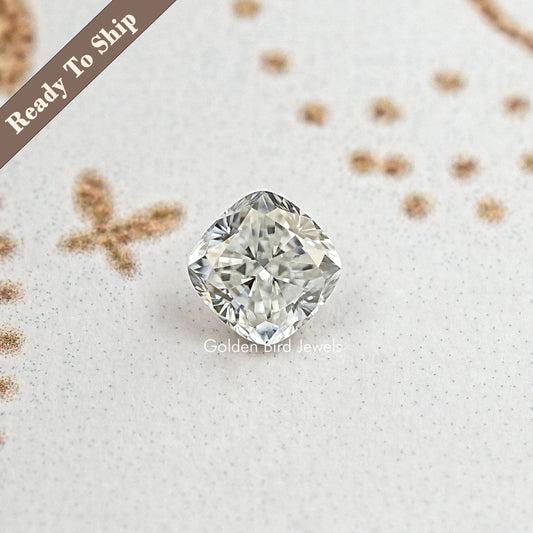 Cushion-cut moissanite loose stone with rounded corners and crisp facets