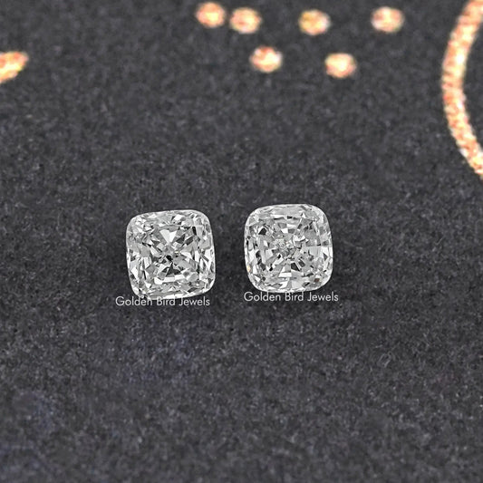 Cushion-cut lab grown diamond stud pair, matching square facets on dark display