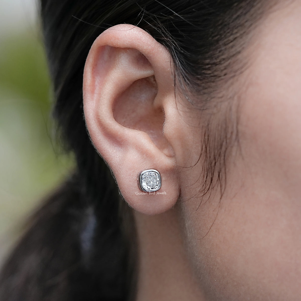 In Ear View of Cushion Cut Lab Diamond Stud Earrings