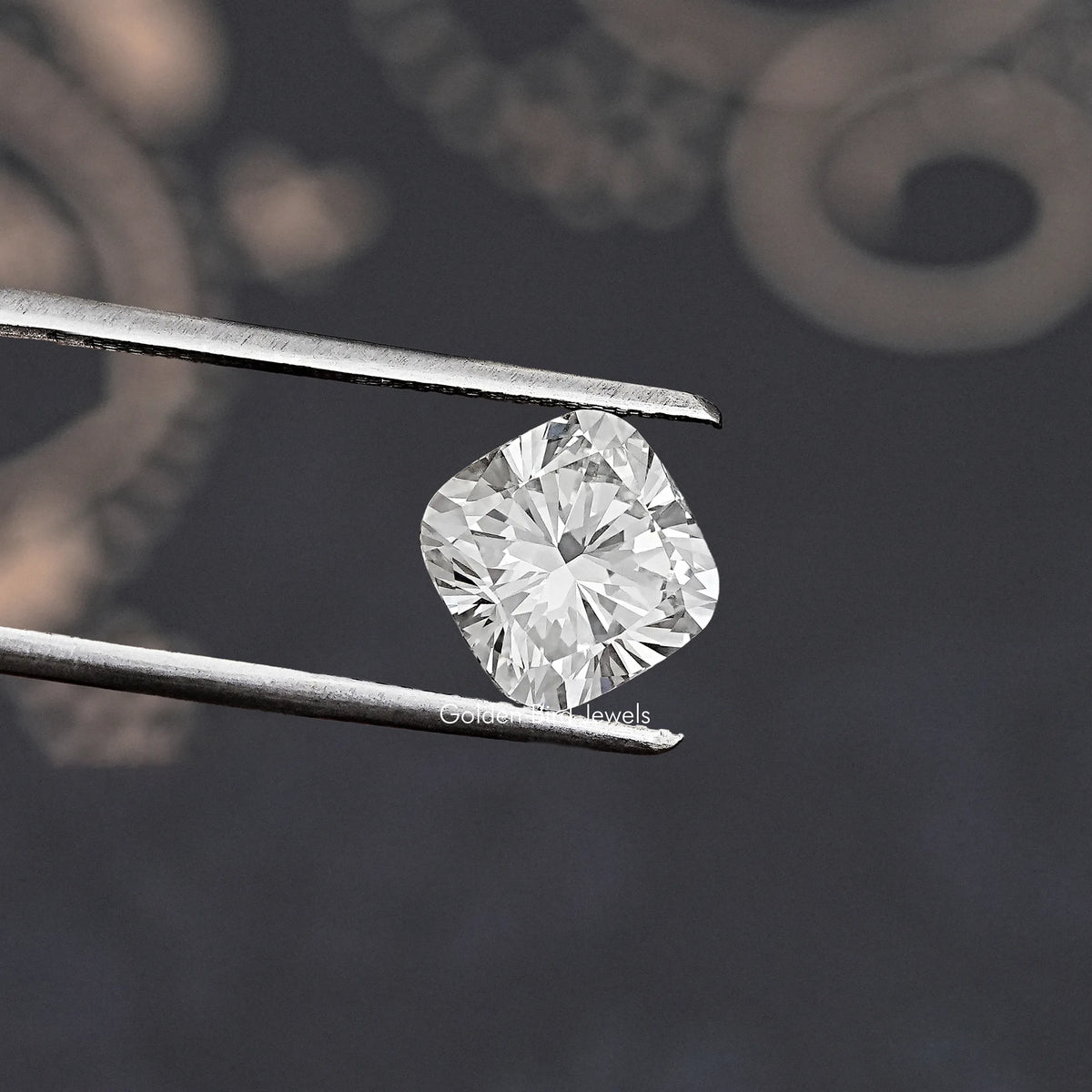 GIA certified cushion-cut lab diamond close-up between tweezers tips