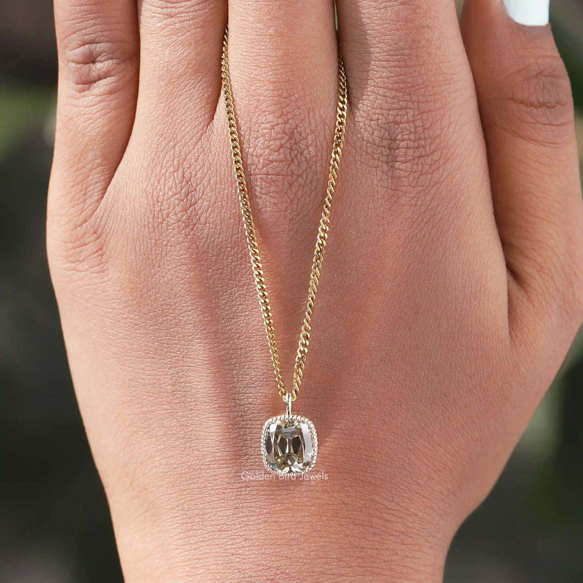 Full view of moissanite pendant in unique shape 