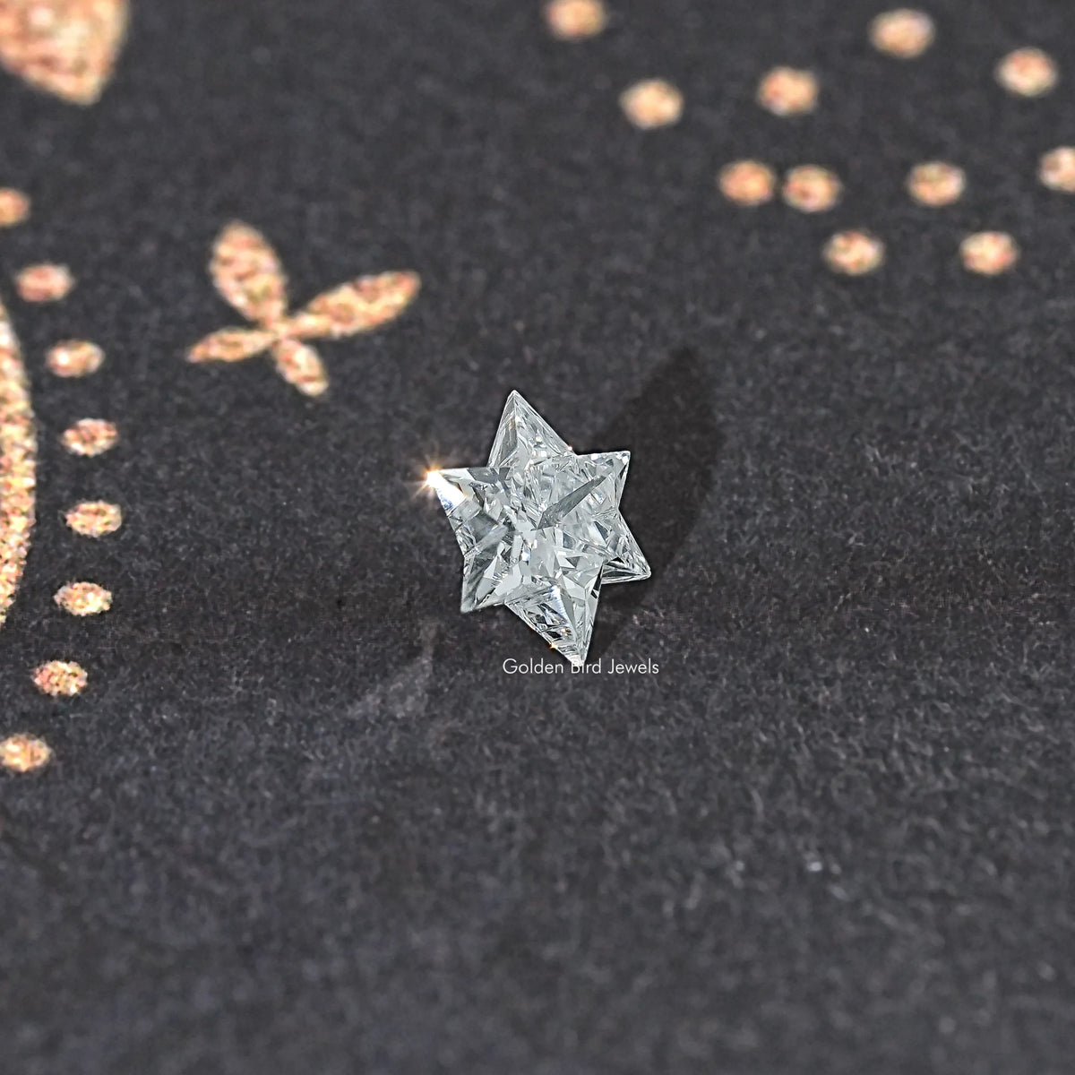 Star-cut loose lab-grown diamond, front view of faceted star
