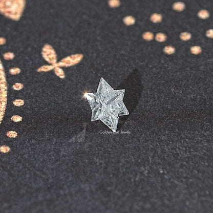 Star-cut loose lab-grown diamond, front view of faceted star