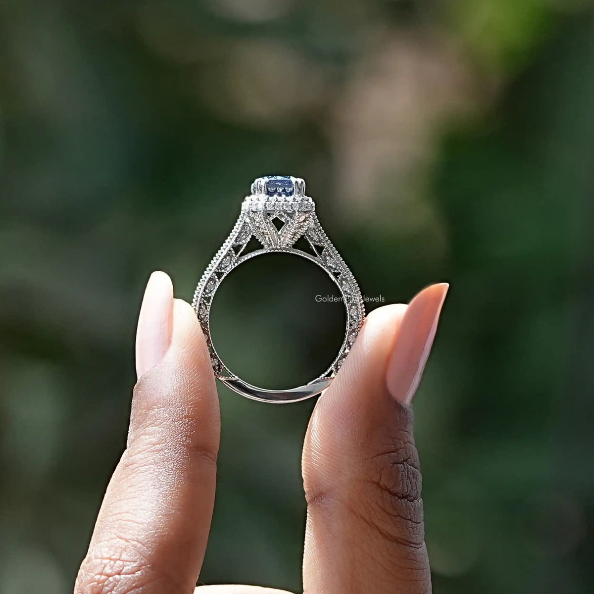 Back View of Double Halo Moissanite Engagement Ring In two fingers
