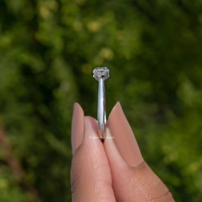 Marquise solitaire ring side profile with prong detail on a thin silver shank