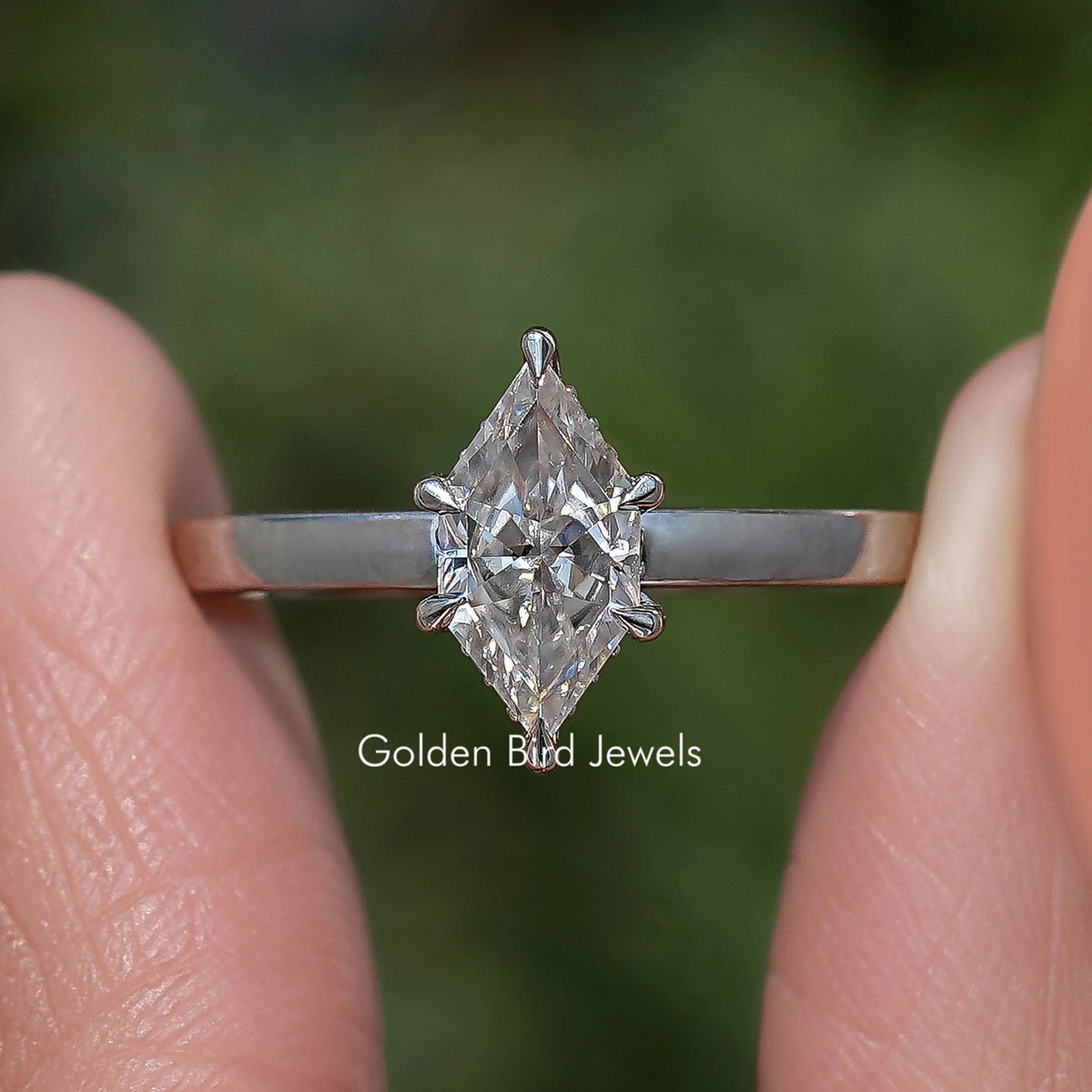 Marquise-cut moissanite engagement ring, silver band, front close-up