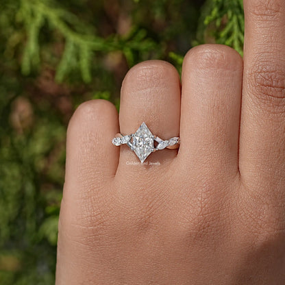 Sterling silver floral wedding ring with marquise-cut moissanite center stone