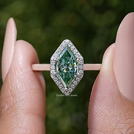Sterling silver marquise moissanite halo wedding ring close-up, green center with halo