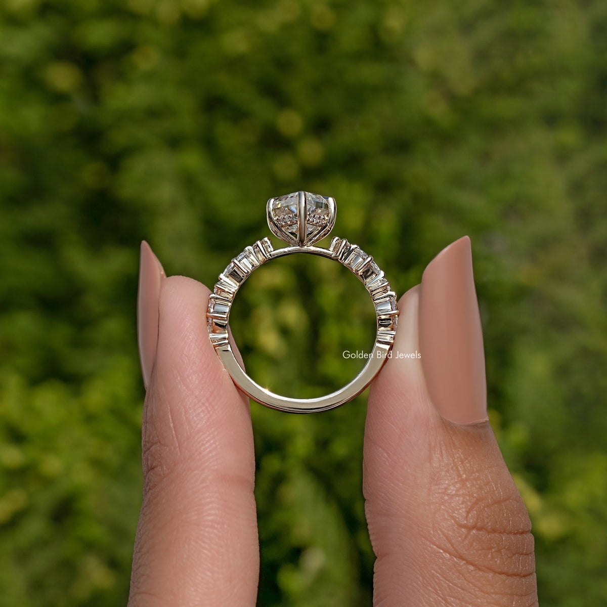 Gold-tone openwork ring with round pave band and arched frame for center stone