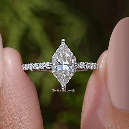 Marquise moissanite solitaire engagement ring with pave band