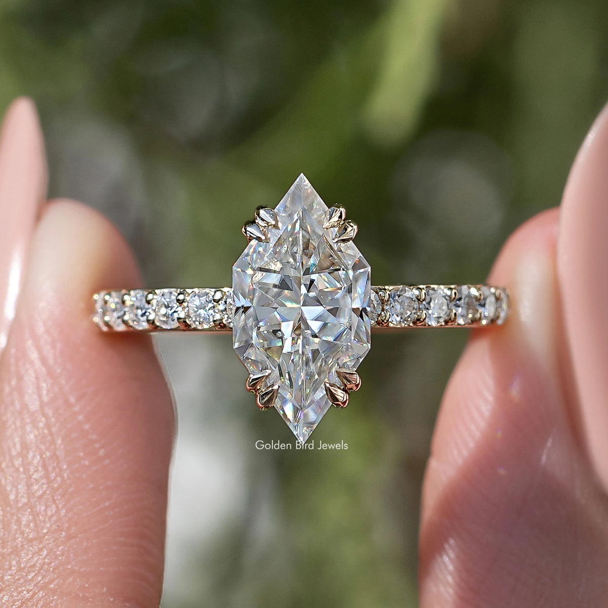 Silver marquise-cut moissanite solitaire ring with baguette pave side stones