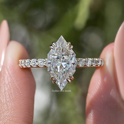 Silver marquise-cut moissanite solitaire ring with baguette pave side stones