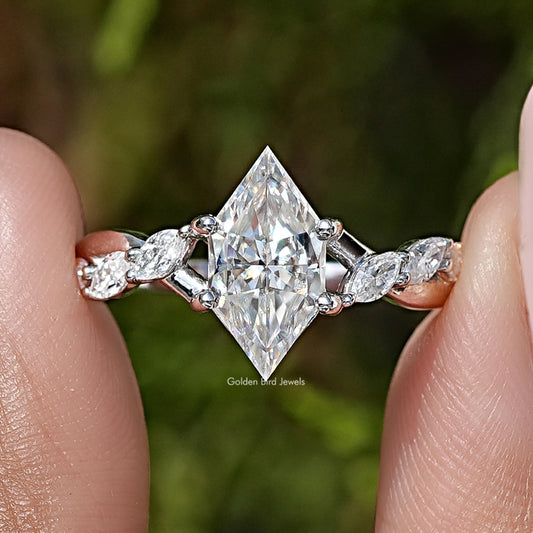 Close-up of sterling silver floral ring with large marquise-cut moissanite