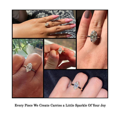 Silver marquise-cut ring with center stone and hidden halo, shown on hand