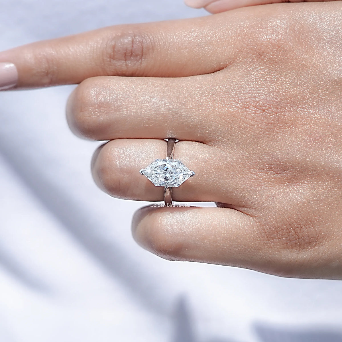 Front view of Dutch Marquise Cut Lab Diamond Solitaire Ring in hand